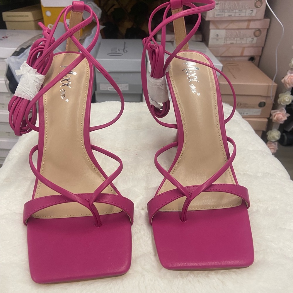 Fuchsia color heels in a size 11